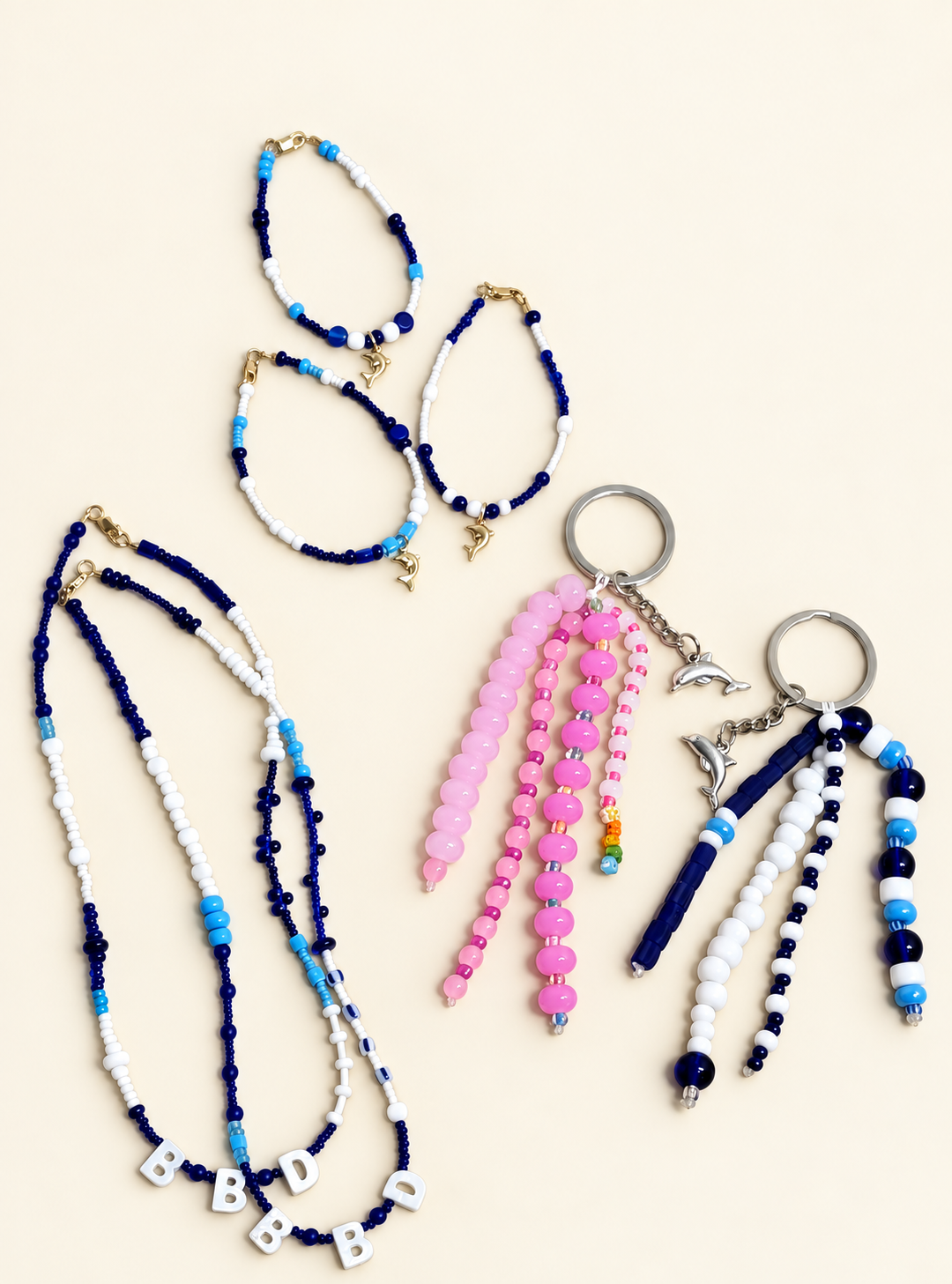 Birmingham Blue Dolphins handmade jewelry and keychains by Mo’s Charm Studio