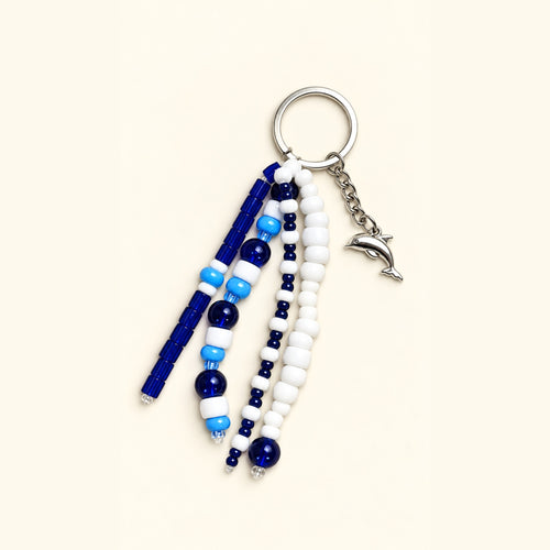 Classic Birmingham Blue Dolphins beaded dolphin keychain by Mo’s Charm Studio