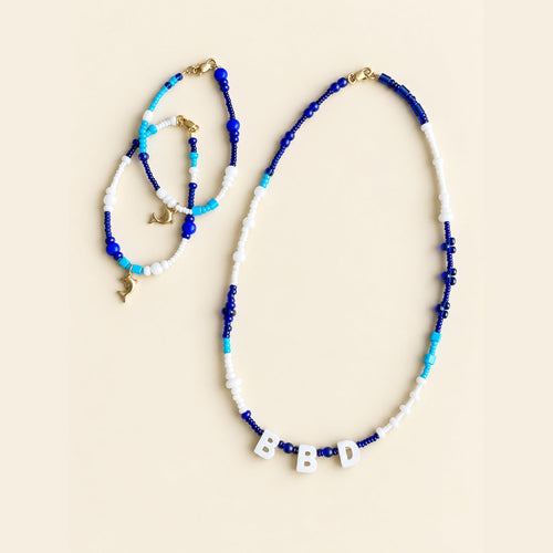 Birmingham Blue Dolphins dolphin bracelet by Mo’s Charm Studio